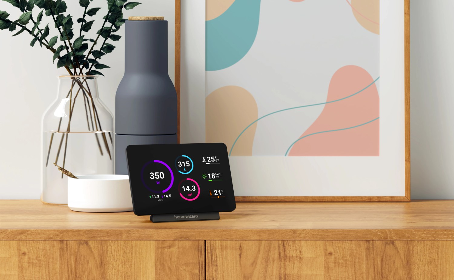 A tablet on a credenza displaying home energy usage data